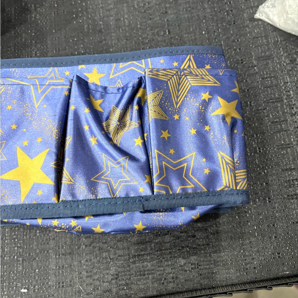 Blue and Gold Star Patterned makeup and makeup brushes holder.